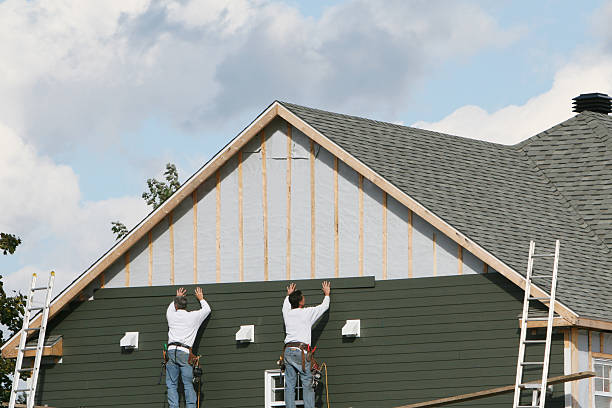 Professional Siding Installation technician working in Shelby, OH